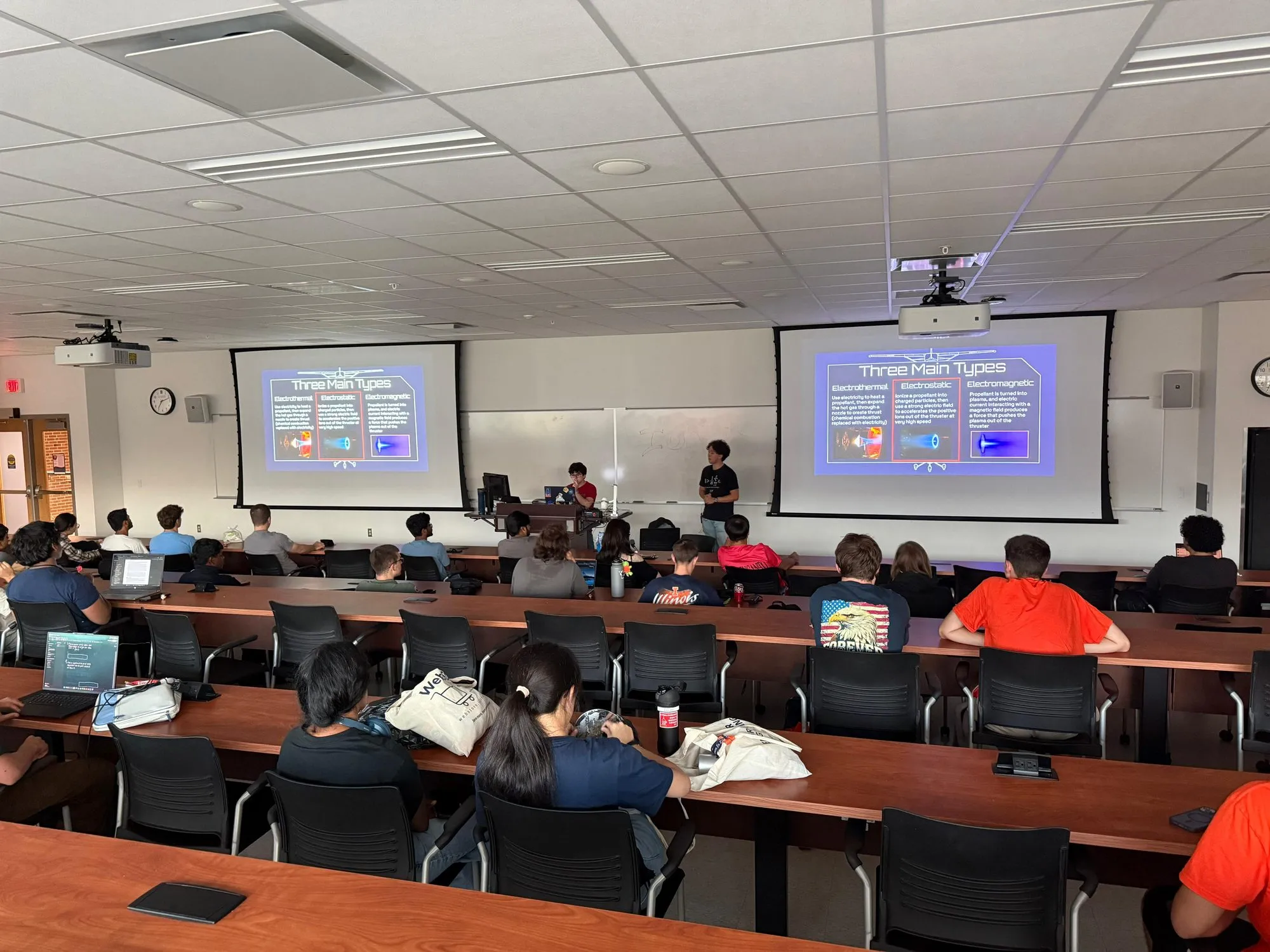 A lecture hall of students seen from the back