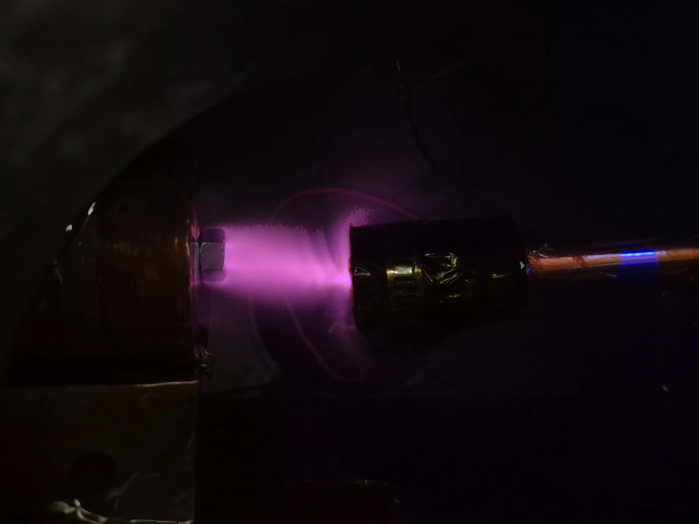 Purple argon plasma from the IonSpark cathode in vacuum