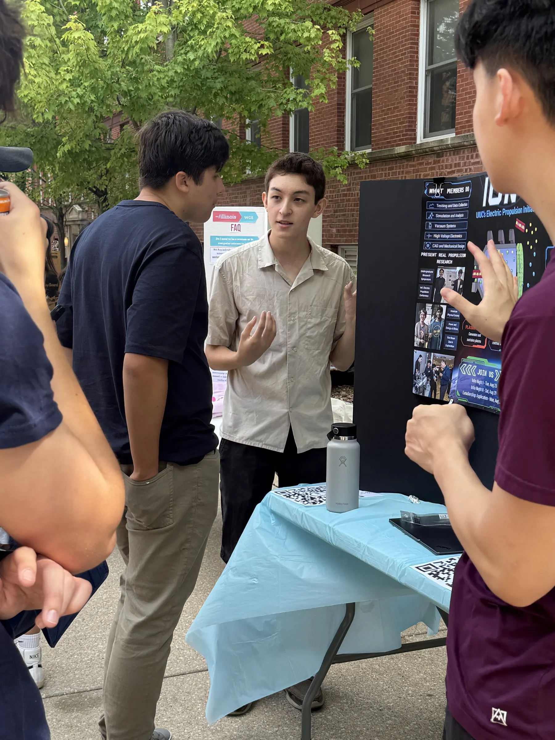 Visitors gathered at the booth